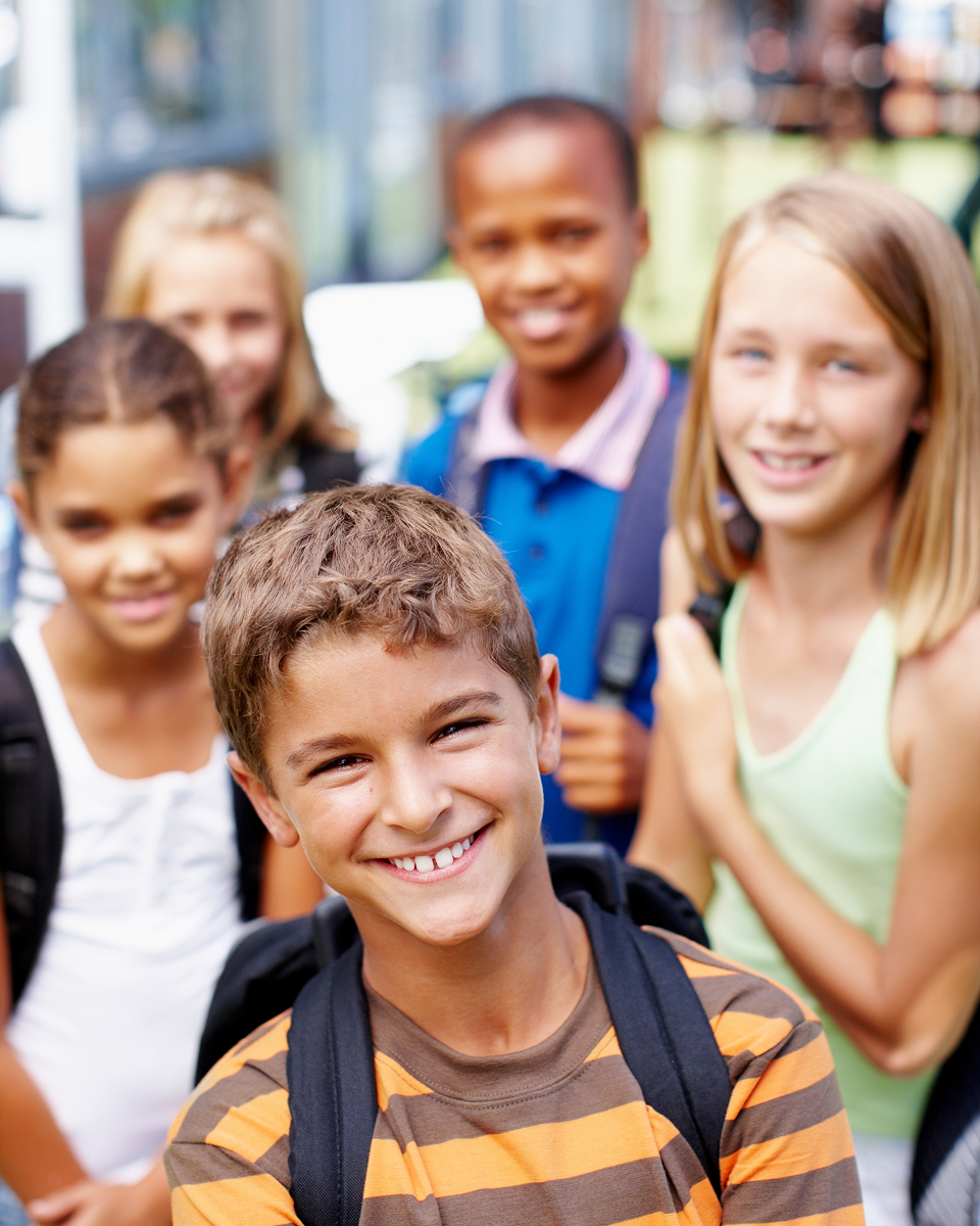 An image of happy kids wearing backpacks is paired next to text about the Allerton Hill team and why they are trusted school communication experts